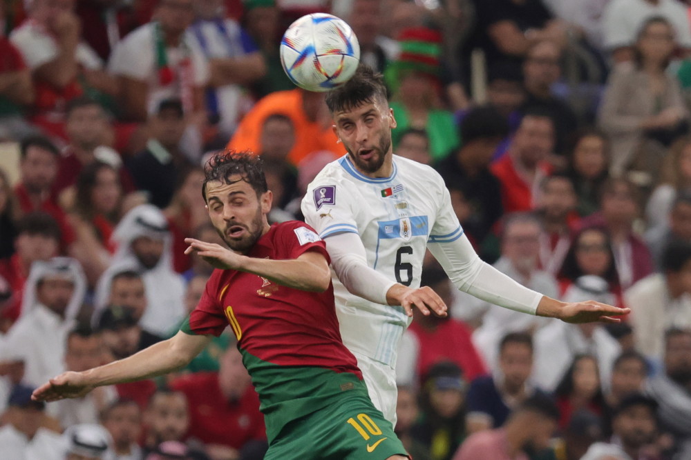 葡萄牙队在比赛中战胜了乌拉圭队,小组出线 葡萄牙队在比赛中战胜了乌拉圭队,小组出线